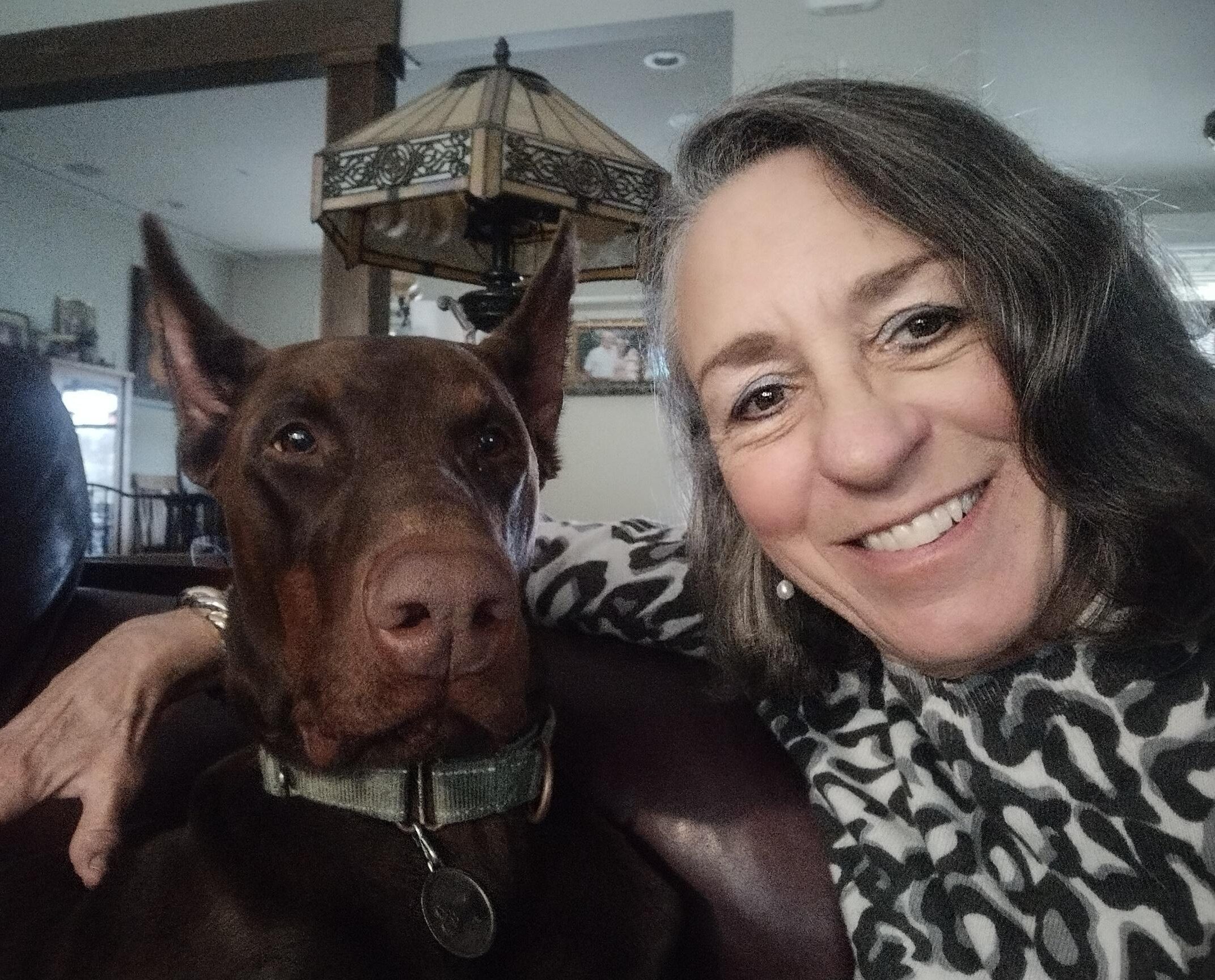 Nancy LaFarriere and doberman red male adult